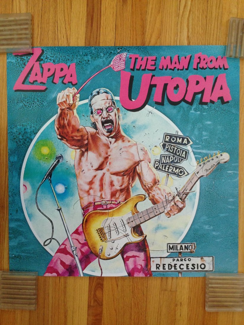 FRANK ZAPPA THE MAN FROM UTOPIA 1983: FRANK ZAPPA THE MAN FROM UTOPIA. 1983 RARE Tour poster original. Frank smashes his Fender Stratocaster. The Man from Utopia is a 1983 album by Frank Zappa. The album is named after a 1950s song, writt
