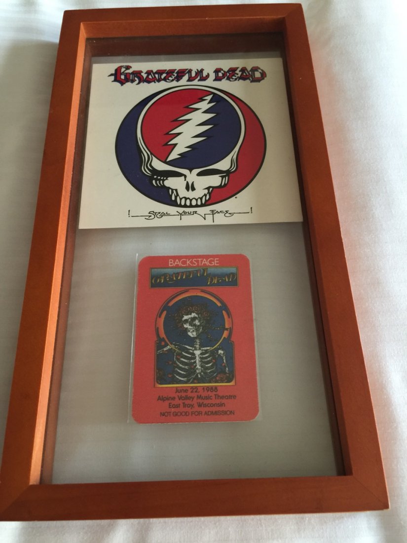 GRATEFUL DEAD BACKSTAGE PASS and STEAL YOUR FACE CARD: GRATEFUL DEAD BACKSTAGE PASS and STEAL YOUR FACE CARD. Original. Framed. from a 1988 Concert in Alpine Valley Music Theater East Troy, Wisconsin. Steal Your Face is a live double album by the Grateful