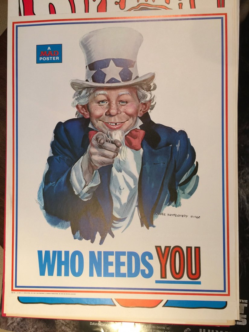 1969 Mad Magazine Poster: E.C. Publishing. 18x24. Alfred E. Nueman. The poster from 1969 has Neuman dressed like Uncle Sam in the famous James Montgomery Flagg recruiting poster of World War I. But instead of “Uncle Sam want