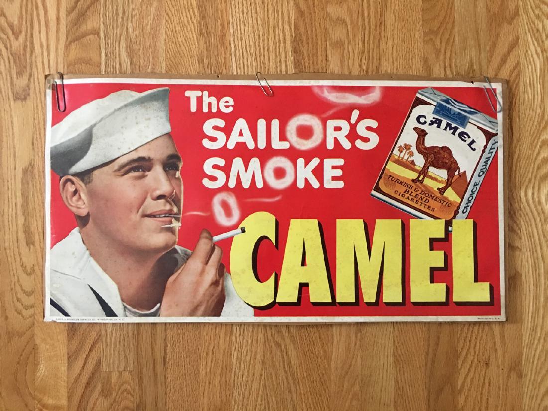 CAMEL CIGARETTE POSTER - VINTAGE: CAMEL CIGARETTE POSTER - VINTAGE. about 24" long. The Sailor's Smoke. R.J. Reynolds Tobacco Co. Winston - Salem, N.C. Light foxing.