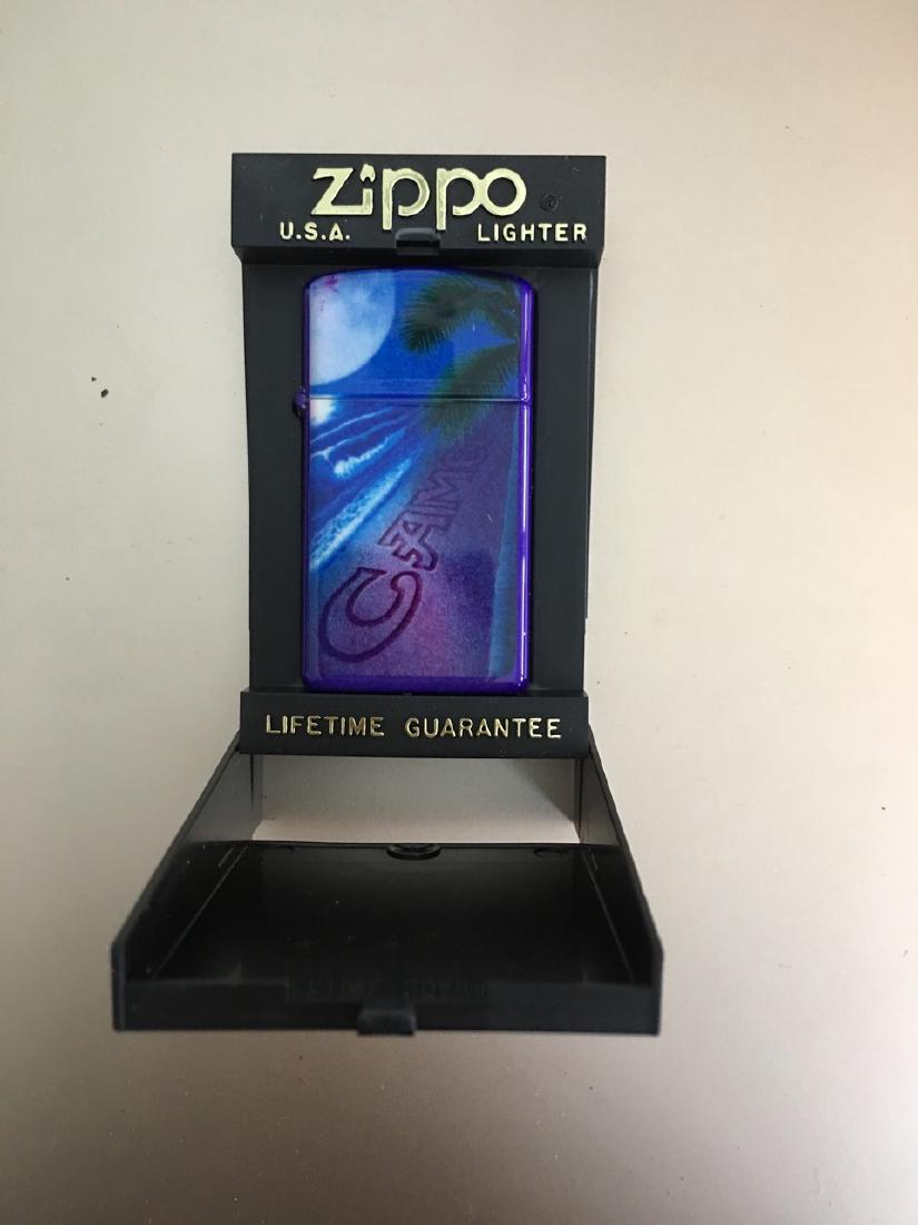 ZIPPO LIGHTER WITH CAMEL CIGARETTE ADVERTISING: ZIPPO LIGHTER WITH CAMEL CIGARETTE ADVERTISING. IN ORIGINAL CASE.