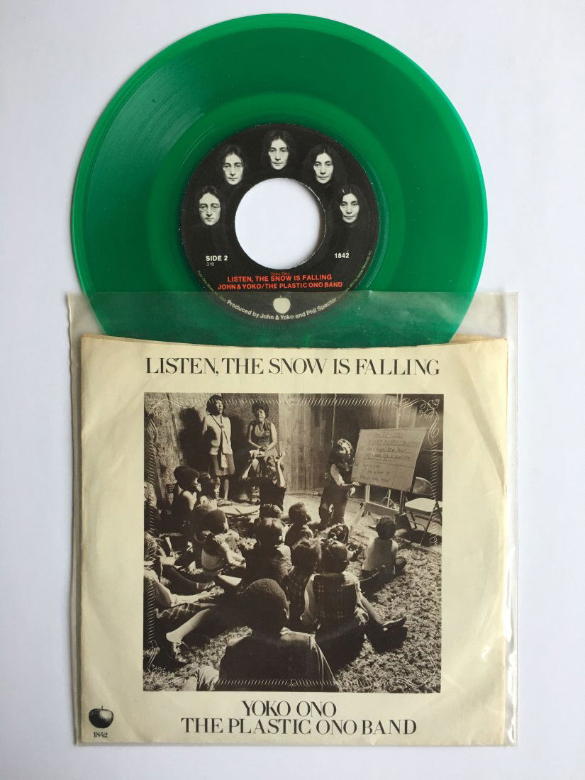 WAR IS OVER - HAPPY CHRISTMAS - JOHN LENNON 45 RECORD: WAR IS OVER - HAPPY CHRISTMAS - JOHN LENNON 45 RECORD WITH LISTEN THE SNOW IS FALLING - YOKO ONO 45 RECORD. RARE GREEN RECORD. These Beatles items came from one person. The lady who owned this entire