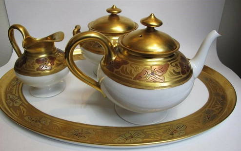 LIMOGES HAVILAND c1915 Gold Arts Crafts Teapot Sugar Bowl Creamer Tray Decorated by Minnie Osborn: N EXCEPTIONAL LIMOGES HAVILAND TEA SET WITH TRAYAn exceptional Haviland Limoges tea set comprising of a teapot, sugar bowl, creamer and tray all in near mint condition. The set is embellished by