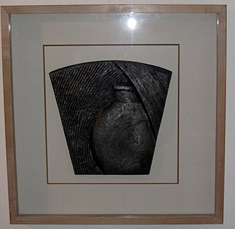 Framed Bas Relief Sculpture Liam Lavery Ireland: AN ALUMINIUM BAS RELEIF SCULPTURE BY IRISH ARTIST LIAM LAVERY This sculpture depicts a water vessel and is contained in a glazed box frame. It measures 23" x 23" x 1.5".