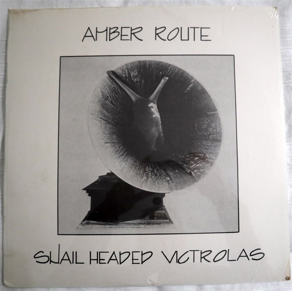 Amber Route Snail Headed Victrolas NM-/NM- Scarce Indie LP: A lovely copy showing very minimal usage only.