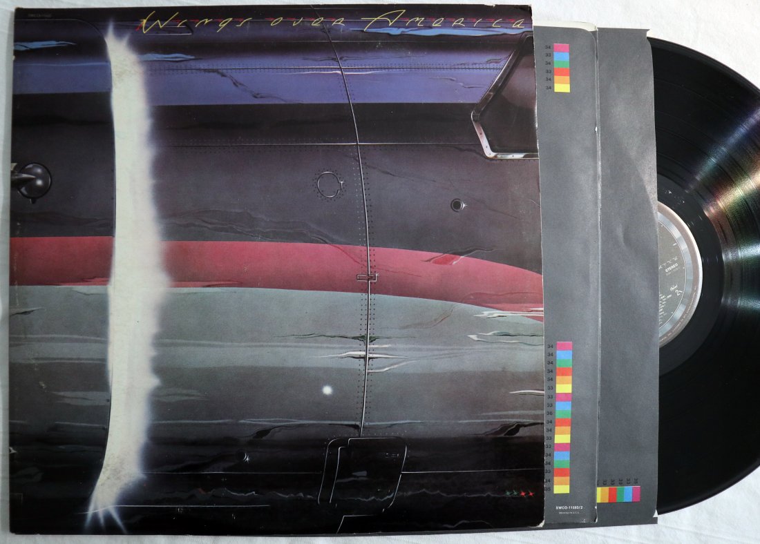 WINGS OVER AMERICA Vinyl 3 x LP Vinyl LP 1976 NM-/NM-: Wings – Wings Over AmericaWings - Wings Over America album coverLabel:Capitol Records – SWCO 11593, Capitol Records – SWCO-11593, MPL (2) – SWCO 11593, MPL (2) – SWCO-11593Format:3 x Vinyl, 