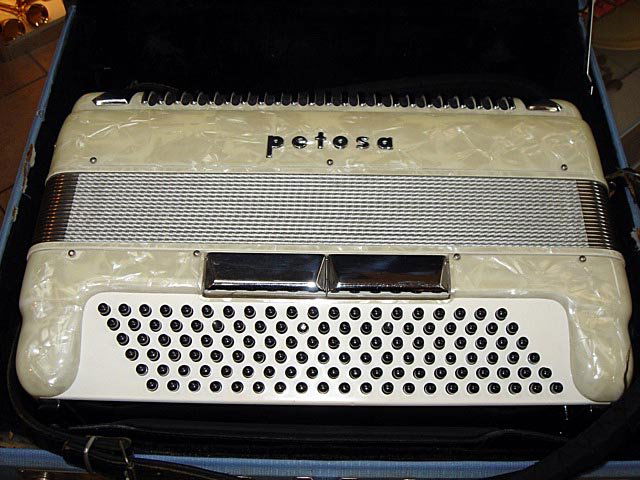 A PETOSA SM400 Ladies Accordion With Case Seattle: A PETOSA SM400 ACCORDION WITH CASE This beautiful accordion is in very good condition, bellows intact and free from scratches etc, just showing a much loved vintage wear. The accordion, which was made
