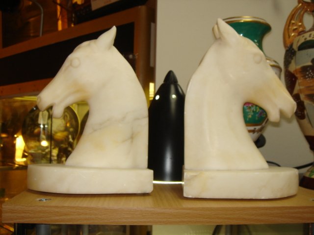 Pr Of Italian White Marble Horses Head Bookends: A PAIR OF 1950'S ITALIAN WHITE MARBLE BOOKENDS These fabulous bookends are in very good condition, alight rust marks in one or two spots, 8.5" in height and very heavy!