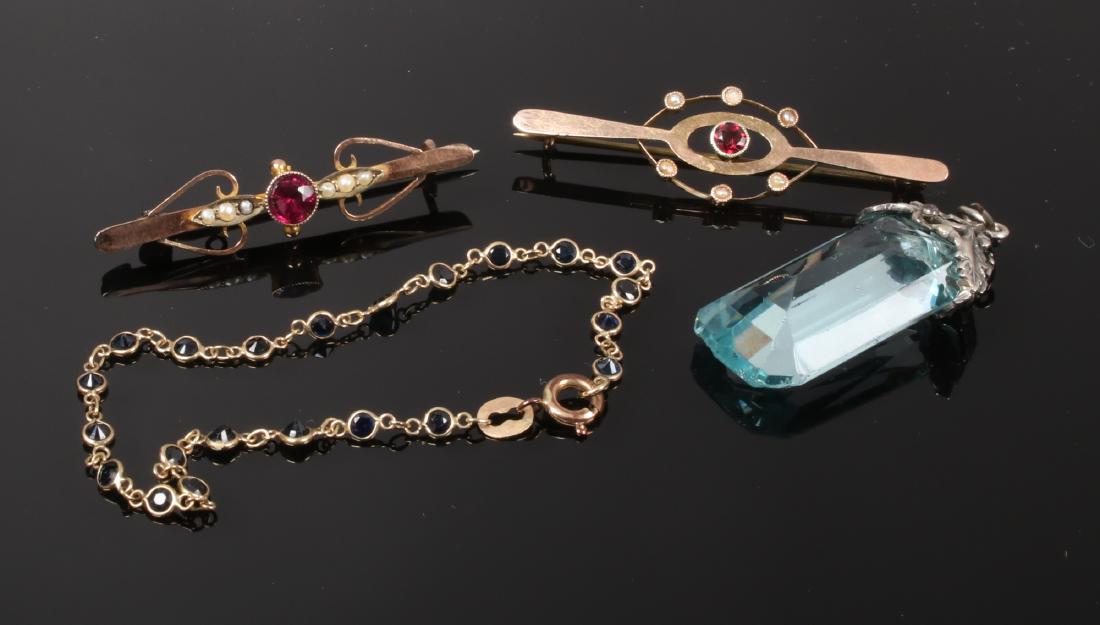 Two 9ct gold garnet and pearl bar brooches, a sapphire (1 of 1)