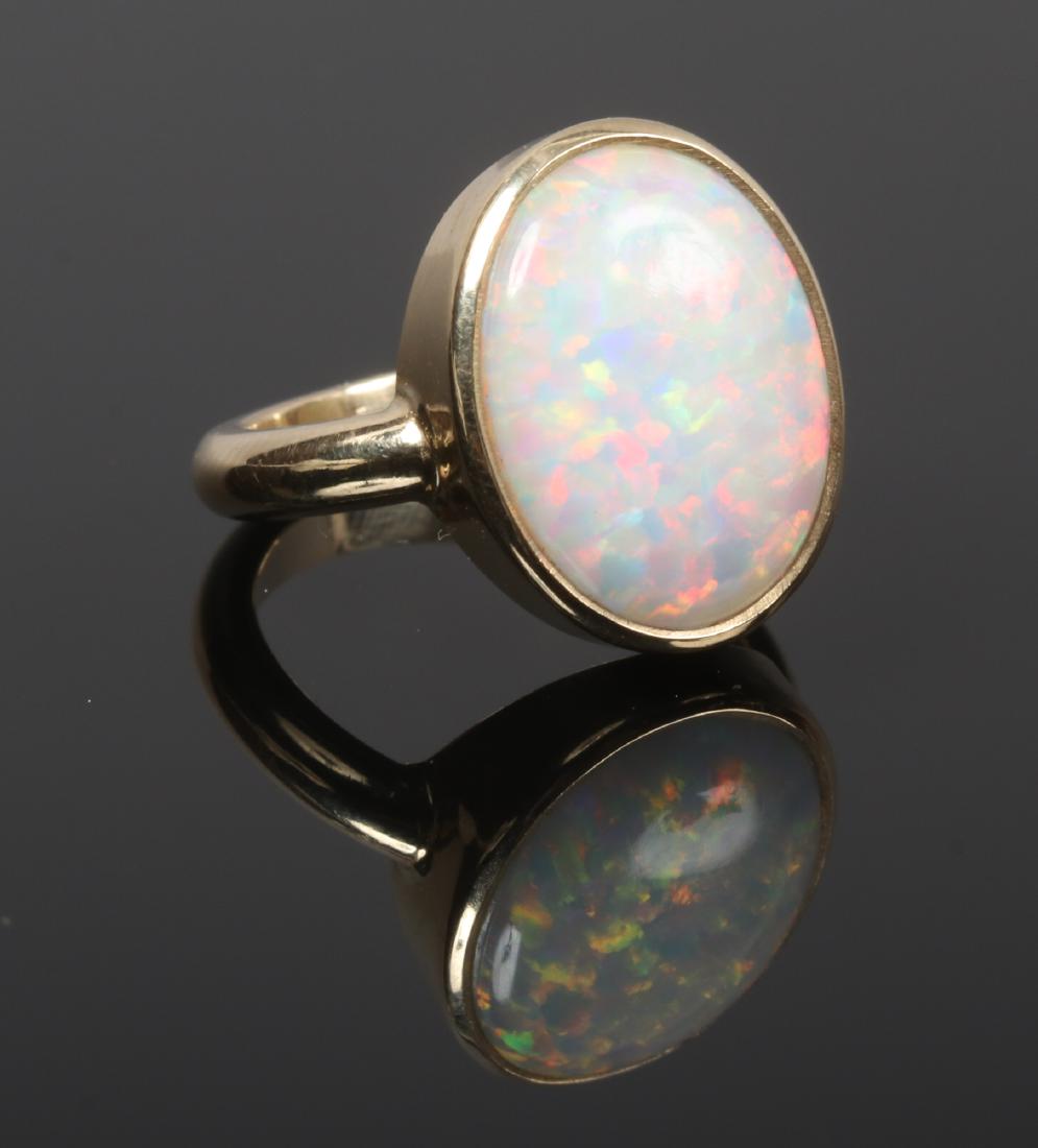 A Gilson opal and yellow metal handmade ring, test as (1 of 1)