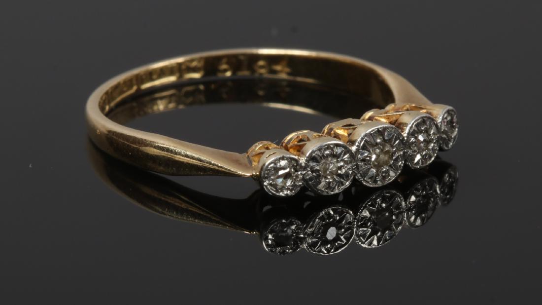 A mid 20th century 18ct gold and platinum five stone (1 of 1)