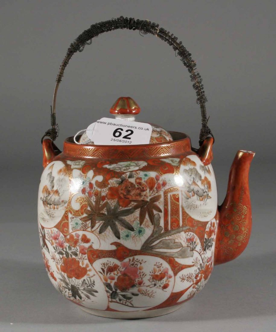 A Japanese Kutani tea pot with metal swing handle, : A Japanese Kutani tea pot with metal swing handle, character marks, 6''.