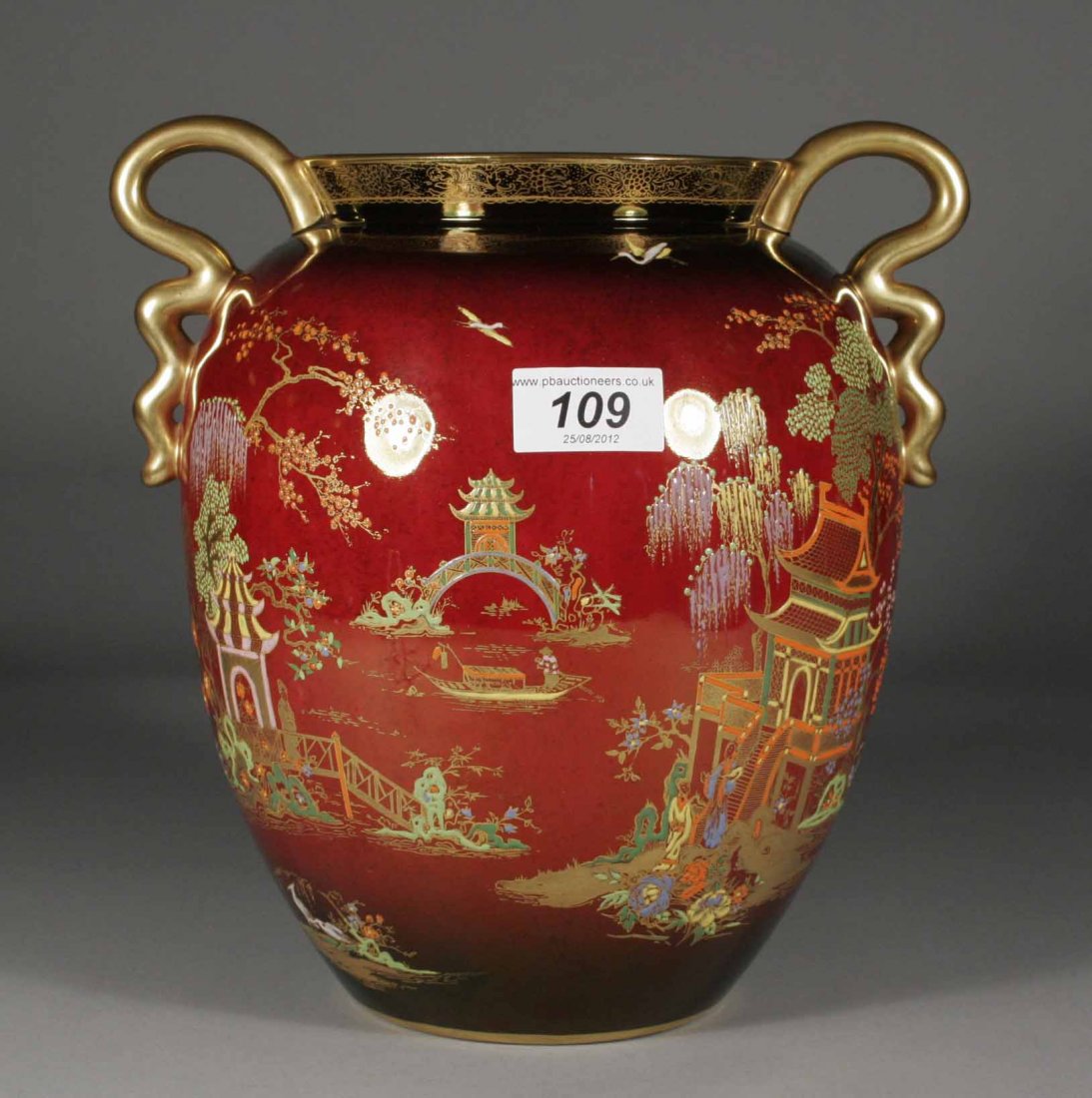A Carlton ware rouge Royale twin handled vase, dec: A Carlton ware rouge Royale twin handled vase, decorated with chinoiserie landscapes, printed mark, 10''.