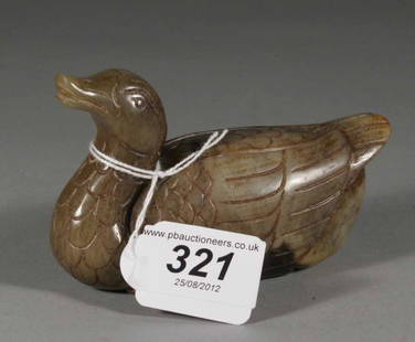 A Chinese carved jade model of a duck.: A Chinese carved jade model of a duck.