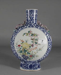 A Chinese moon flask with lizard moulded handles, pa: A Chinese moon flask with lizard moulded handles, painted in underglaze blue with lotus scrolls and two roundels enamelled in the famille rose style, Xuantong four character mark and period, 10''.