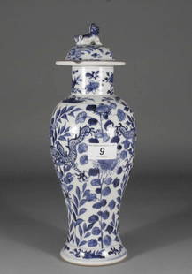 A Chinese baluster jar and cover painted in undergla: A Chinese baluster jar and cover painted in underglaze blue with dragons and foliage, Kangxi mark but later, 13''.