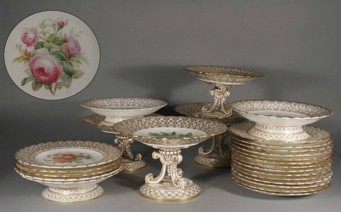 A nineteenth century Minton twenty five piece dess: A nineteenth century Minton twenty five piece dessert service, enamelled with botanical subjects under moulded gilt borders, impressed marks.