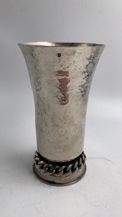 Jean Despres - Art Deco Metal Vase H: 4.8": Shipping in USA $ 25 + Insurance Jean DesprÃ©s was a French jewelry maker and designer best known for his intricate Art Deco jewelry made from semi-precious stones, machine parts, and enamel. Despr�