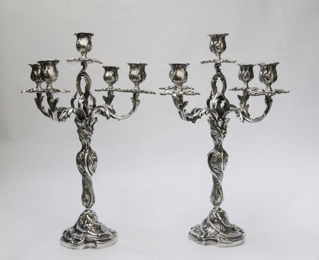 Christofle Pair of Silverplated Bronze Candelabras: H: 16.8" Shipping in USA $ 120 Christofle is a goldsmith and tableware company, founded in Paris in 1830 by Charles Christofle. The company is known for having introduced electrolytic gilding and silv