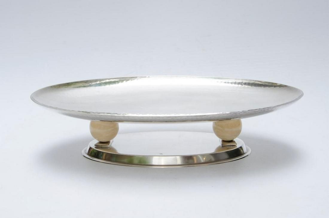 Jean Puiforcat Art Deco Silverplate Centerpiece France: H:3.3" W:19" D:13.5" Shipping in USA $ 90 Jean ElysÃ©e Puiforcat was a French silversmith, sculptor and designer. Miller's Antiques Encyclopedia calls Puiforcat the "most important French Art Deco s