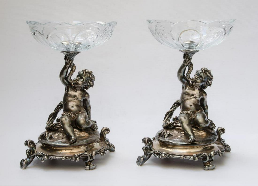Christofle Pr of Bronze & Crystal Centerpieces H: 11": Shipping in USA $ 100 Christofle is a goldsmith and tableware company, founded in Paris in 1830 by Charles Christofle. The company is known for having introduced electrolytic gilding and silver platin