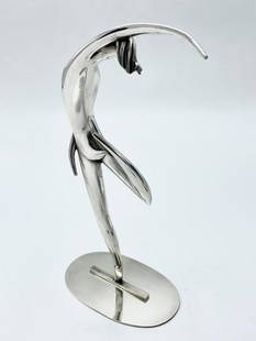 Atelier Hagenauer Art Deco Figure of Lady 11" x 5.5"  Austria: Shipping in USA $ 55 Karl Hagenauer was an influential Austrian designer in the Art Deco style. Goldsmith. Carl Hagenauer founded what became the WerkstÃƒÂ¤tte Hagenauer Wien in 1898. His oldest s