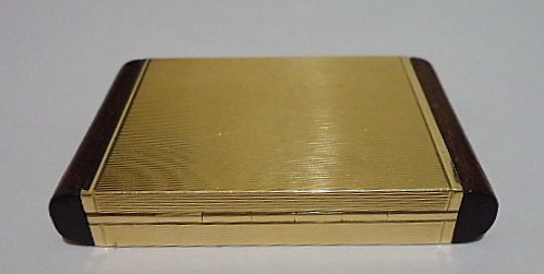 Austrian 14K Gold Pill Box: Bearing the 4th standard gold mark used from 1925-2001, the W in the assay mark signifies Vienna, this particular Vienna mark was used from 1938-2001, dating the box to after 1938.23.7 grams.(.76 troy