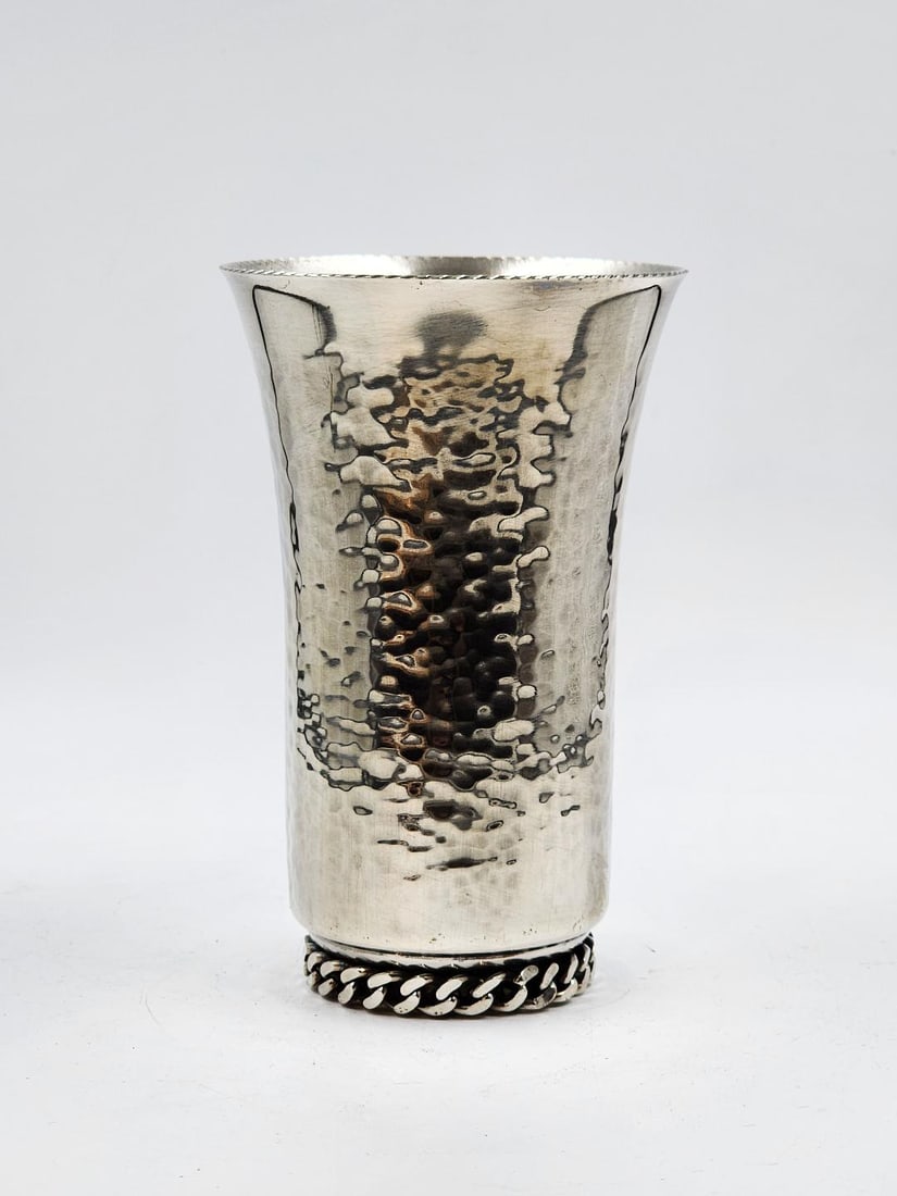 Jean Despres Art Deco Hammered Vase H: 5" D: 3.2" France: Shipping in USA $ 35. Jean Despres was a French jewelry maker and designer best known for his intricate Art Deco jewelry made from semi-precious stones, machine parts, and enamel. Despres' aesthetics 