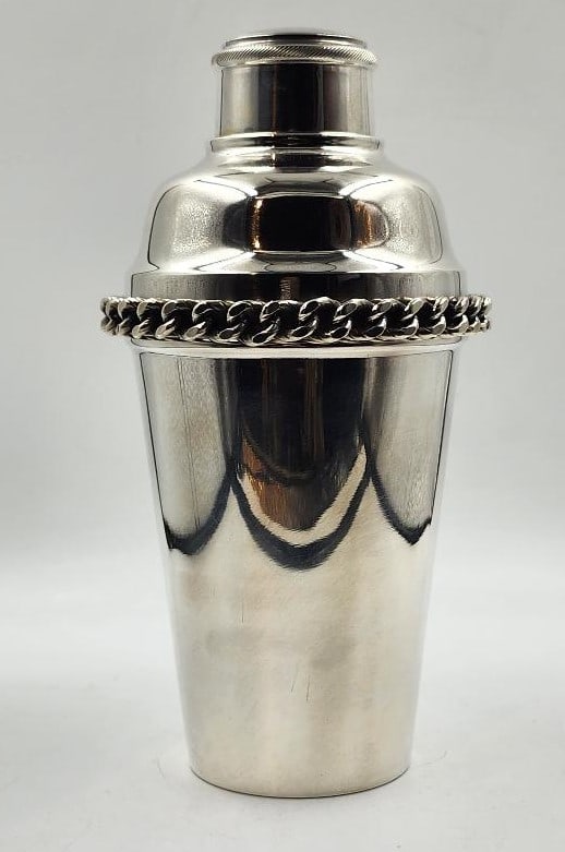 Jean Despres Art Deco Cocktail Shaker H: 9" France: Shipping in USA $ 65. Jean Despres was a French jewelry maker and designer best known for his intricate Art Deco jewelry made from semi-precious stones, machine parts, and enamel. Despres' aesthetics 