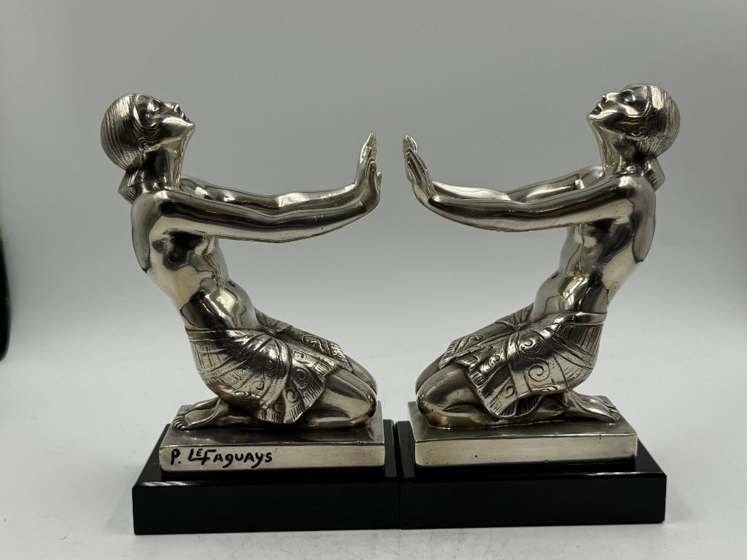 Pierre Le Faguays Pair of Art Deco Bronze Bookends 6.3 x 4.2": hipping in USA $ 120. Pierre Camille Marie Le Faguays was a French Art Deco sculptor. He also used the pseudonyms Fayral, and Guebre. Le Faguays made statuettes, lamps and decorative objects.