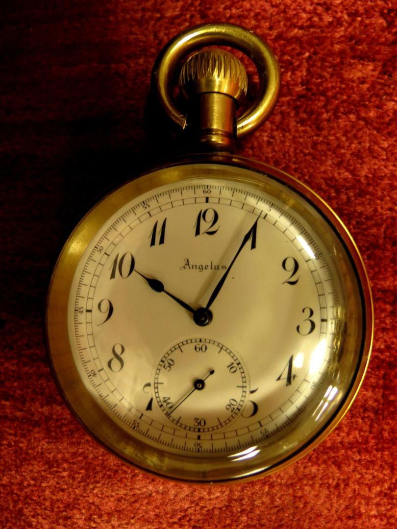 Pocket Watch , Angelus, Swiss Made: Dia. 2.2" - Est. Shipping= $ 12
