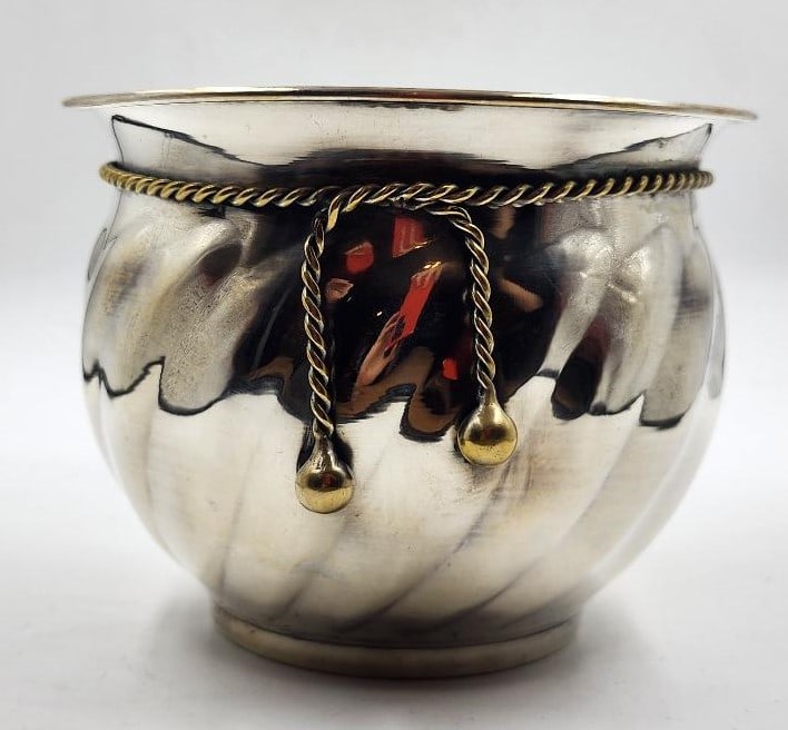 Maria Pergay Art Deco Silverplated Centerpiece H: 4.3" Diam: 5.5": Shipping in USA $ 45 Born in 1930, Maria Pergay is one of the most innovative and influential French furniture designers of her time, recognized internationally as an iconic tastemaker.