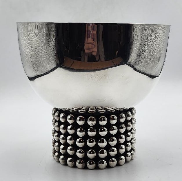 Jean Despres Art Deco Silverplated Centerpiece H: 6" Diam: 6.3" France: Shipping in USA $ 120. Jean Despres was a French jewelry maker and designer best known for his intricate Art Deco jewelry made from semi-precious stones, machine parts, and enamel. Despres' aesthetics