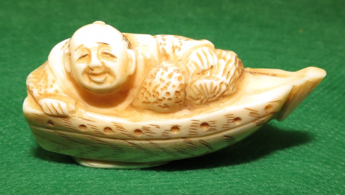 Ivory Netsuke , Man on Fishing Boat. Signed: U.S. Shipping= $ 9