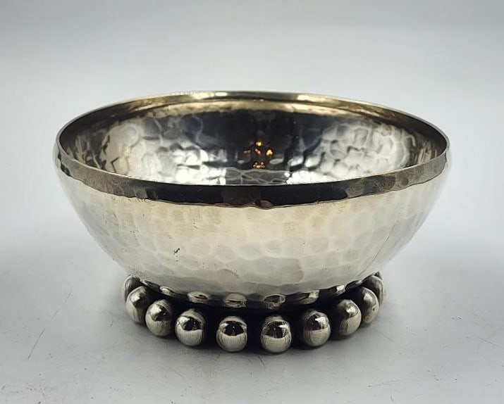 Jean Despres Art Deco Small Centerpiece H: 2" Diam: 4" France: Shipping in USA $ 35. Jean Despres was a French jewelry maker and designer best known for his intricate Art Deco jewelry made from semi-precious stones, machine parts, and enamel. Despres' aesthetics