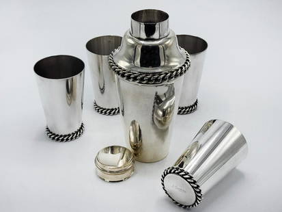 Jean Despres Art Deco 5 Pieces Set Cocktail Shaker H: 9" 4 Cups H: 5"France: Shipping In - House available - Jean Despres was a French jewelry maker and designer best known for his intricate Art Deco jewelry made from semi-precious stones, machine parts, and enamel. Despres' a