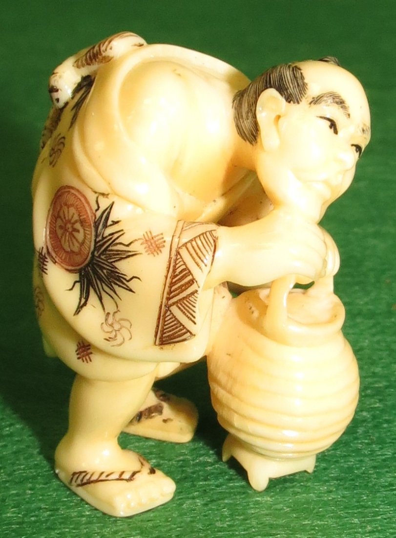 Ivory Netsuke, Man w/basket,signed.: Est. Shipping = $10 to U.S