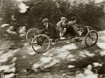 Jacques Henri Lartigue Zissou conduisant son 'Bob a 4 Roues': Shipping in - House available. Jacques-Henri Lartigue Zissou driving his 4 wheel Bob with Oleo and Louis as passengers too heavy the Bob is going to go into a tree. French text: conduisant son 'Bob a