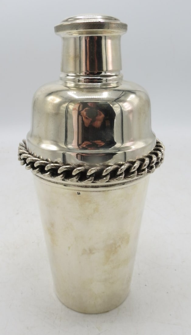 Jean Despres Silverplated Art Deco Cocktail Shaker H: 8.8" France: Shipping in - House available Jean Despres was a French jewelry maker and designer best known for his intricate Art Deco jewelry made from semi-precious stones, machine parts, and enamel. Despres' aes