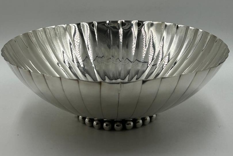 Jean Despres Art Deco Silverplated Centerpiece H: 3" Diam: 5" France: Shipping in - House available Jean Despres was a French jewelry maker and designer best known for his intricate Art Deco jewelry made from semi-precious stones, machine parts, and enamel. Despres' aes
