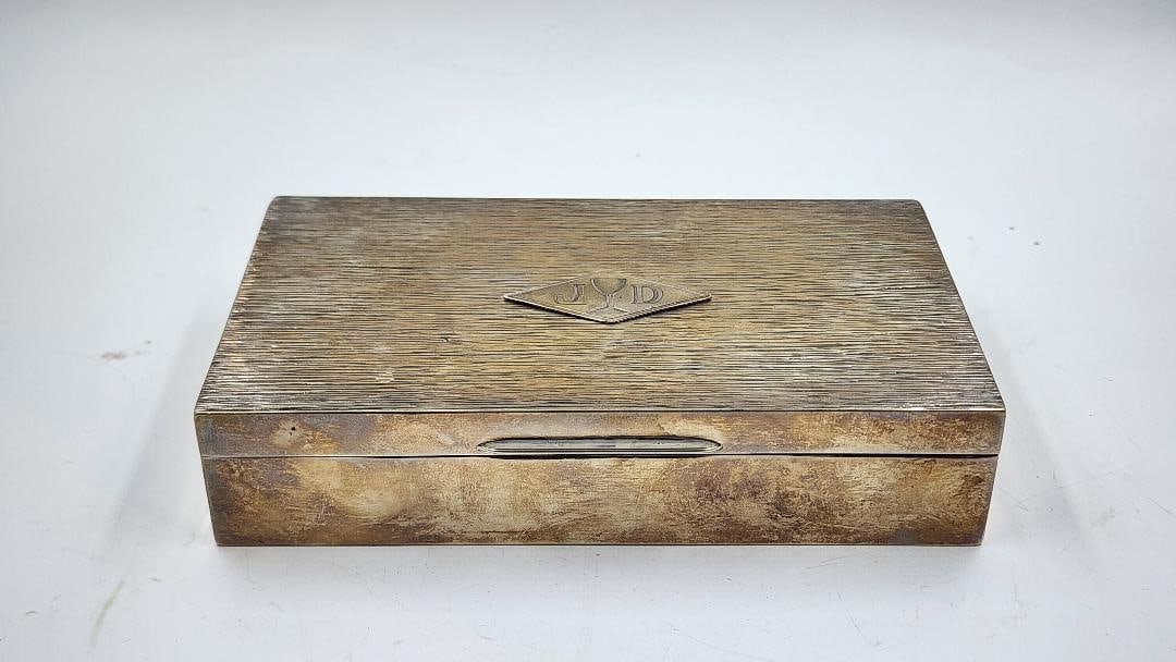 Jean Despres Art Deco Sterling Silver Box H: 1.2" W: 6" D: 3.5" Signed - France: Shipping in - House available Jean Despres was a French jewelry maker and designer best known for his intricate Art Deco jewelry made from semi-precious stones, machine parts, and enamel. Despres' aes