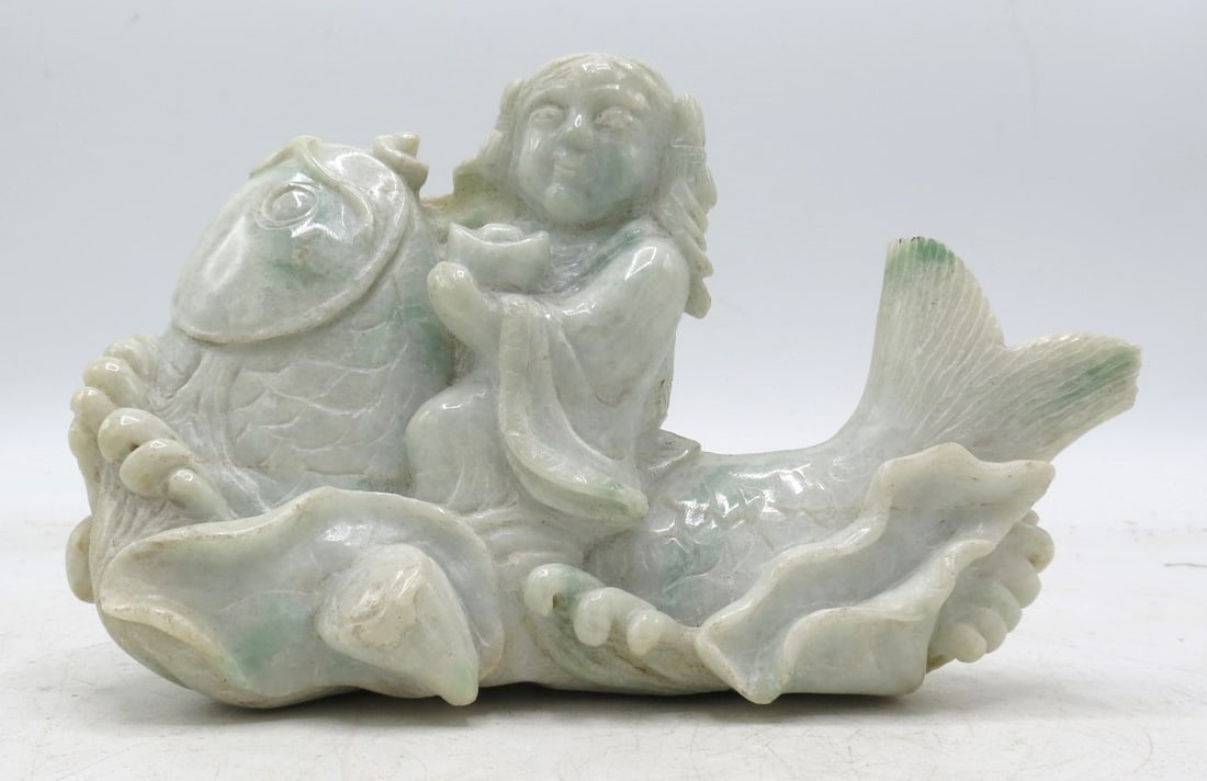 Jadeite Hand Carved Sculpture H: 4" W: 6" D: 3" China ( Circa 1900s}: Shipping in - House available Jadeite a green, blue, or white mineral which is one of the forms of jade. It is a silicate of sodium, aluminum, and iron and belongs to the pyroxene group