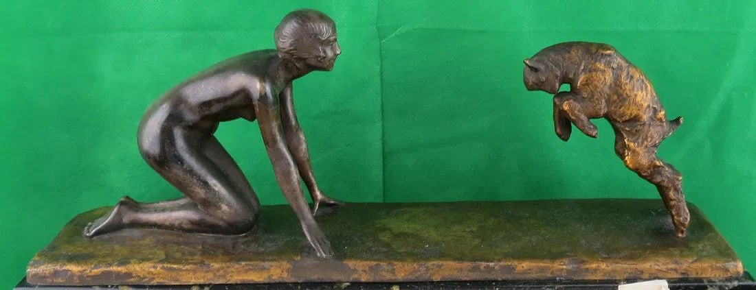 Victor Silvestre (19th/20th Century) "Jeune Femme au Cabri" Sculpture: Shipping in - House available. H: 7" W: 17" D: 5" - VICTOR SILVESTRE (FRENCH, 1884-1976) "JEUNE FEMME AU CABRI" SILVERED BRONZE SCULPTURE, whimsical depiction of girl and goat from the Art Deco period