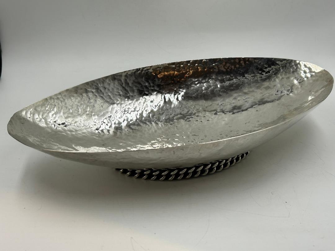 Jean Despres Large Silverplated Art Deco Centerpiece H: 2" Diam: 11" France: Shipping in - House available - Jean Despres was a French jewelry maker and designer best known for his intricate Art Deco jewelry made from semi-precious stones, machine parts, and enamel. Despres' a