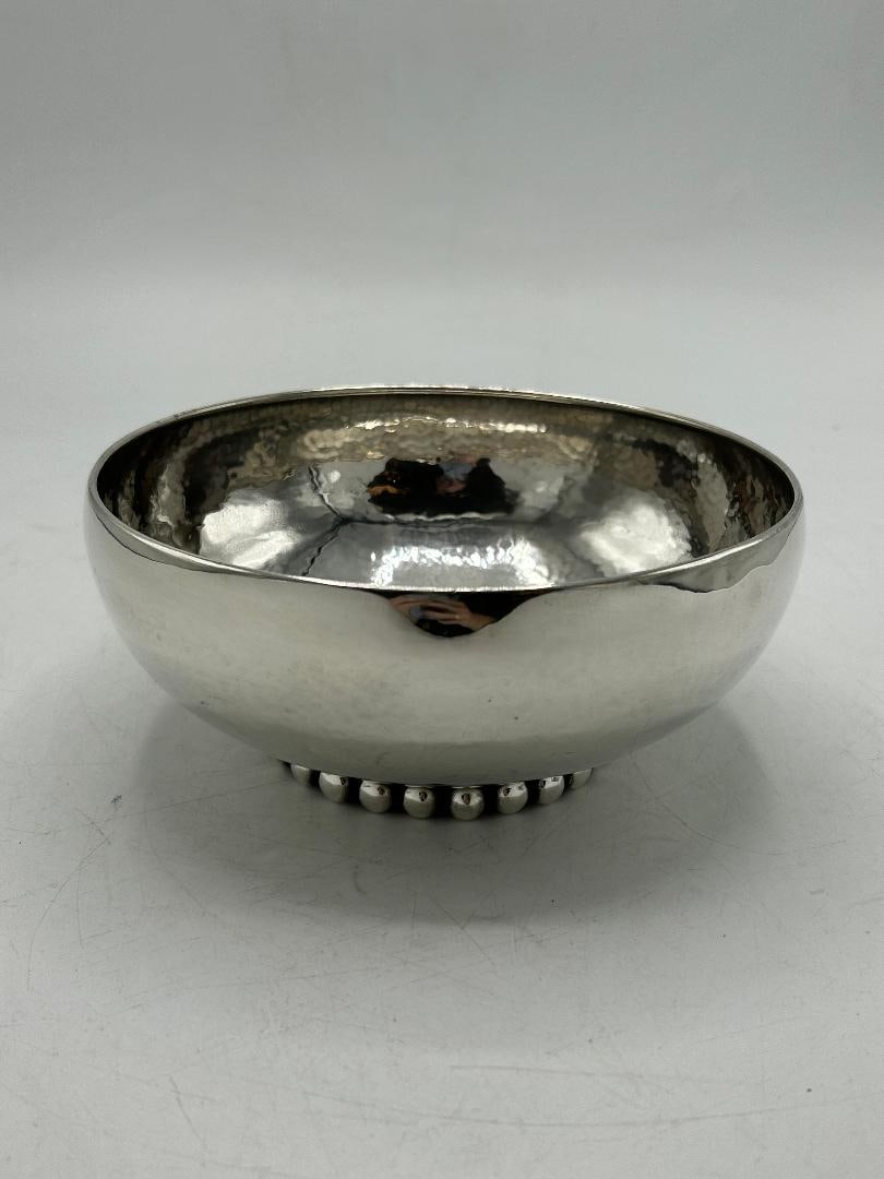 Jean Despres Silverplated Art Deco Centerpiece H: 3.3" Diam: 7.3"France: Shipping in - House available Jean Despres was a French jewelry maker and designer best known for his intricate Art Deco jewelry made from semi-precious stones, machine parts, and enamel. Despres' aes