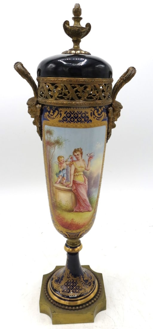 Sevres Porcelain Urn - Romantic Scene H: 14" D: 4.7" France: France - Shipping In - House available - The Manufacture nationale de Sevres is one of the principal European porcelain manufactories. It is located in Sevres, Hauts-de-Seine, France. It is the contin