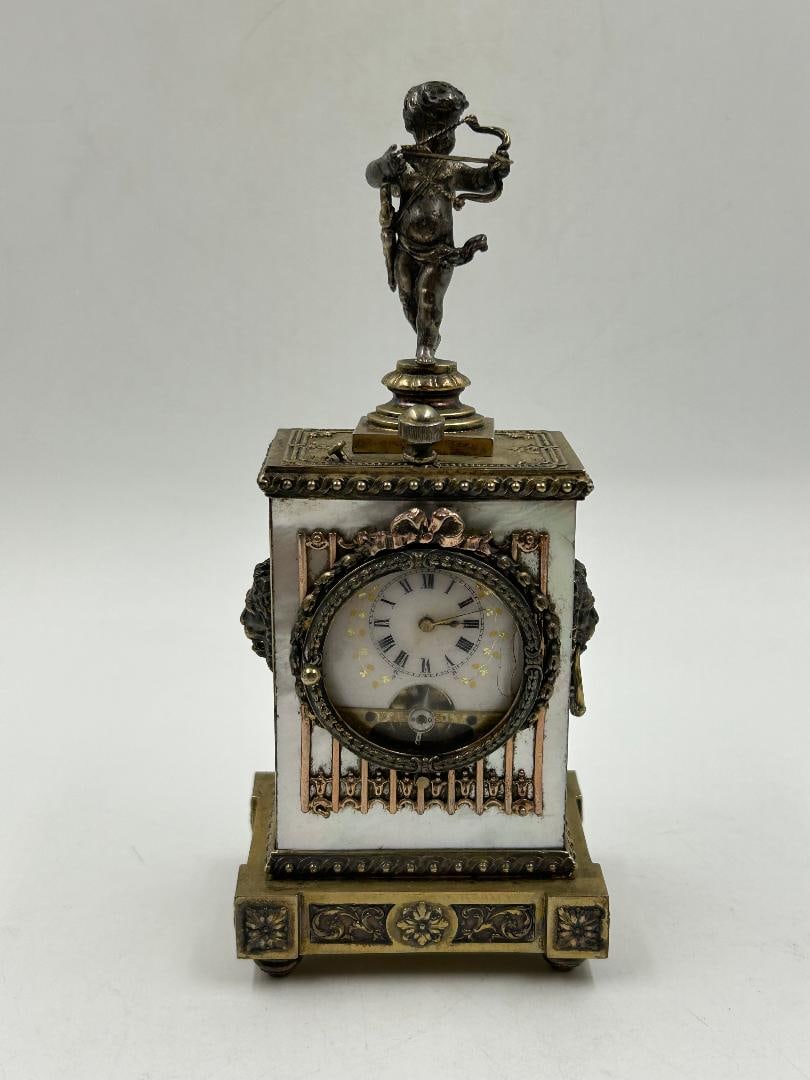 Sterling Silver & Mother of Pearl Clock w/ Cherub H: 5" W: 2" D: 1.8": Shipping in - House available