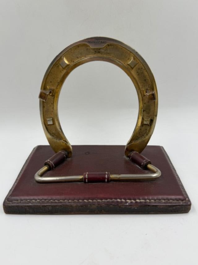 Hermes Paris Bronze & Leather Horseshoe Paper Holder 5" x 6" France: We have an in-house shipping department to ensure your post-purchase processing is as easy as possible. We encourage you to call us 561-2129413 or contact carstensgalleries@yahoo.com if you have any f