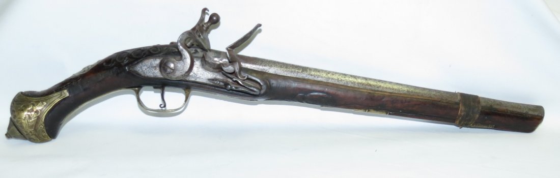 Flintlock Ottoman Pistol: Large 19th CenturyTurkish/Middle Eastern pistol the Style reflects both, Oriental and European influences. Brass butt.trigger guard.Long: 20" Est Shipping $ 40 to USA