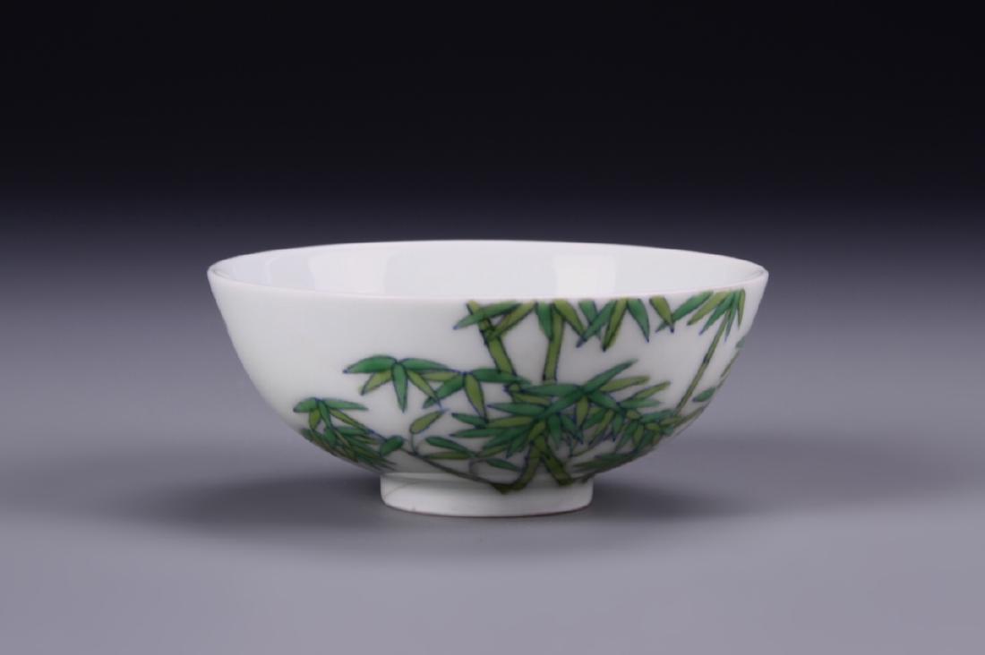 Chinese Antique Doucai Bowl: China, Antique Doucai Bowl, wide mouth with tapering sides to footed base, simplistic bamboo design throughout exterior with plain interior, six character mark on base. Width 3 5/8 in., Height 1 1/4 i